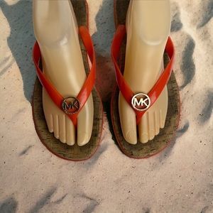 Michael Kor’s Orange Plastic T-Strap Sandals